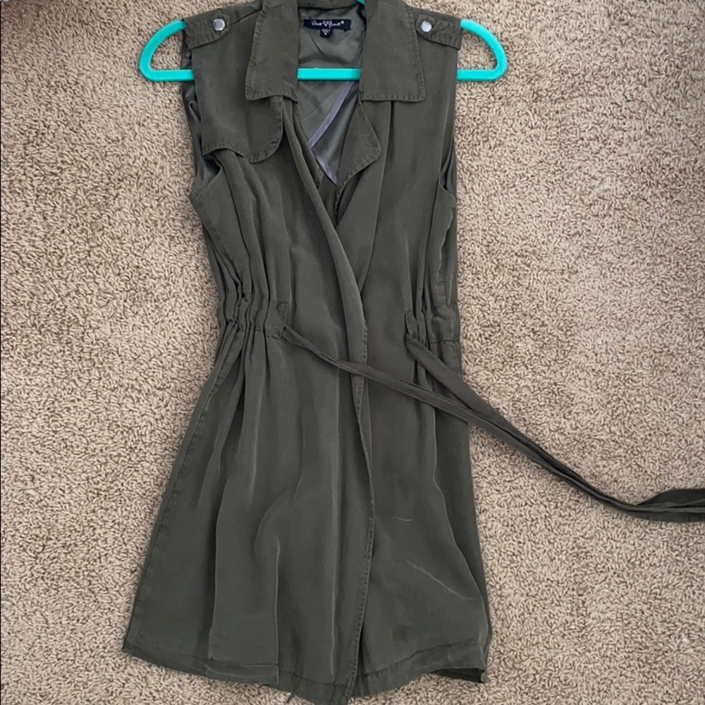 Green sleeveless jacket